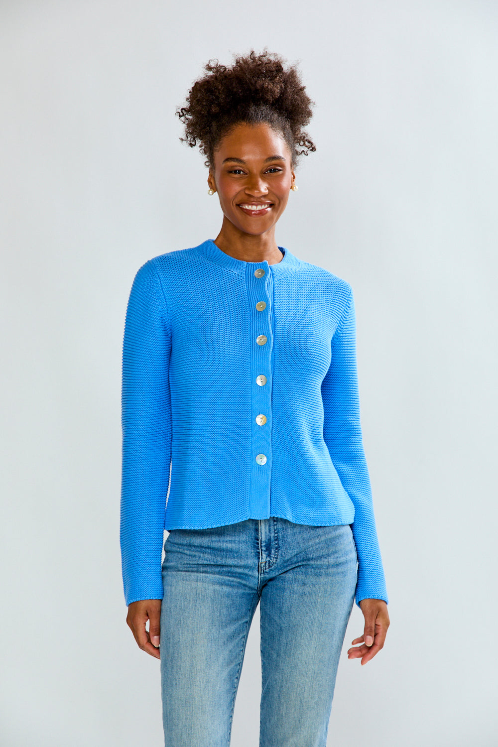 woman in periwinkle sweater