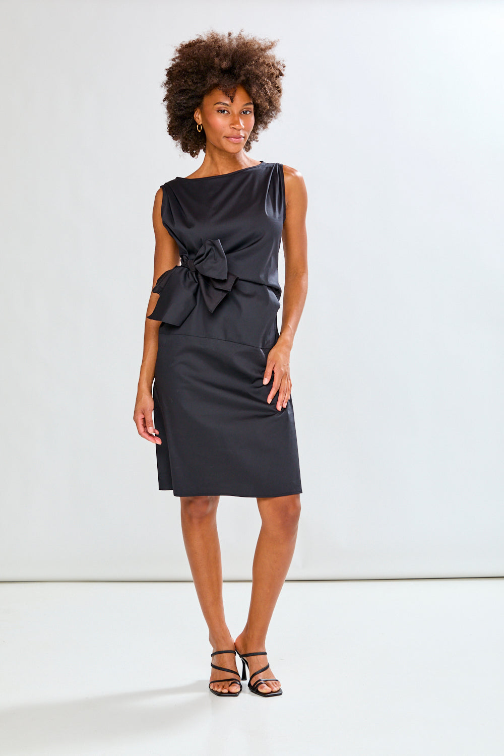 woman in a black dress