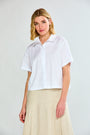 Woman wearing The Beatrix Top in White