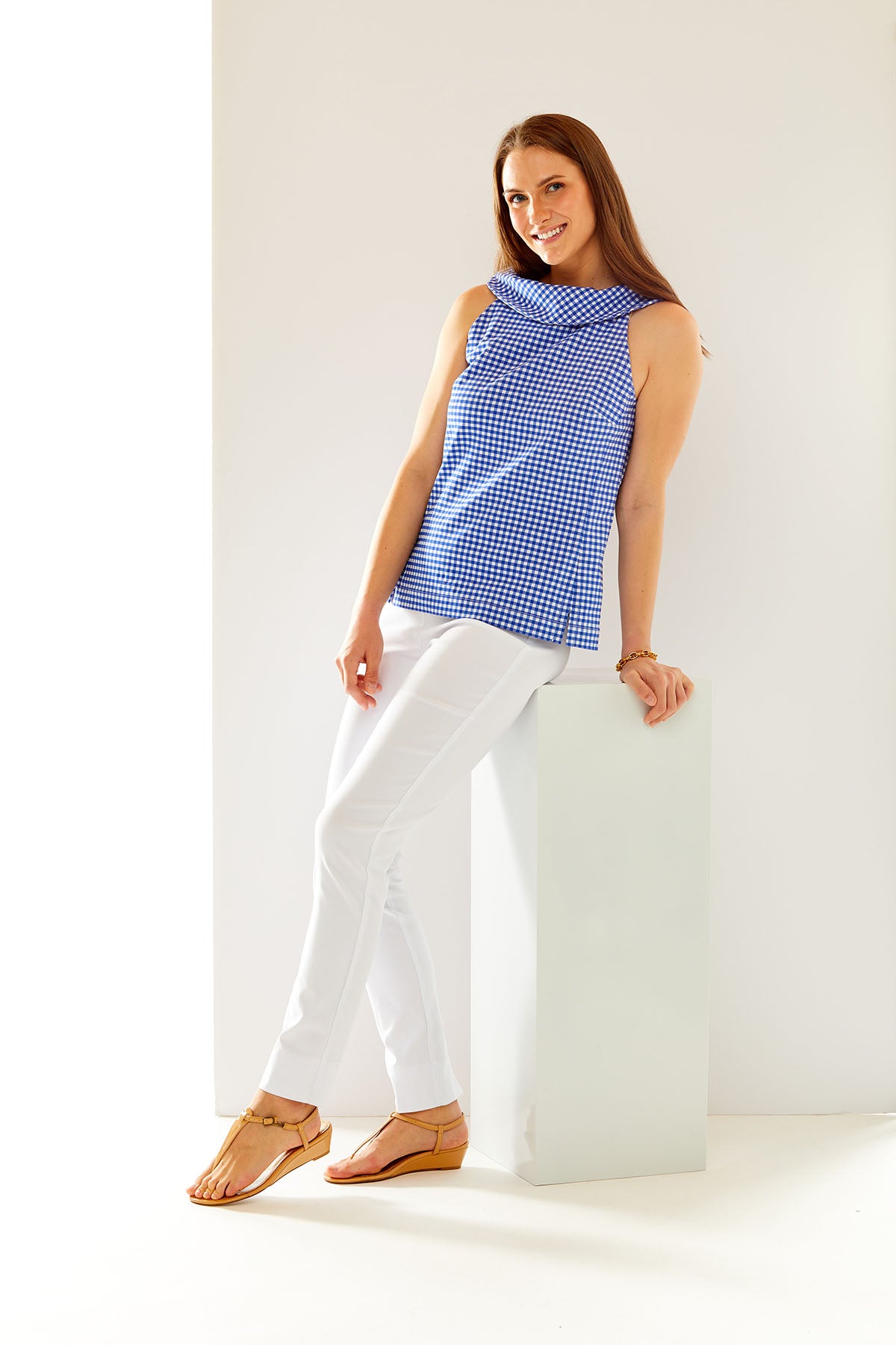 Woman in blue and white gingham top