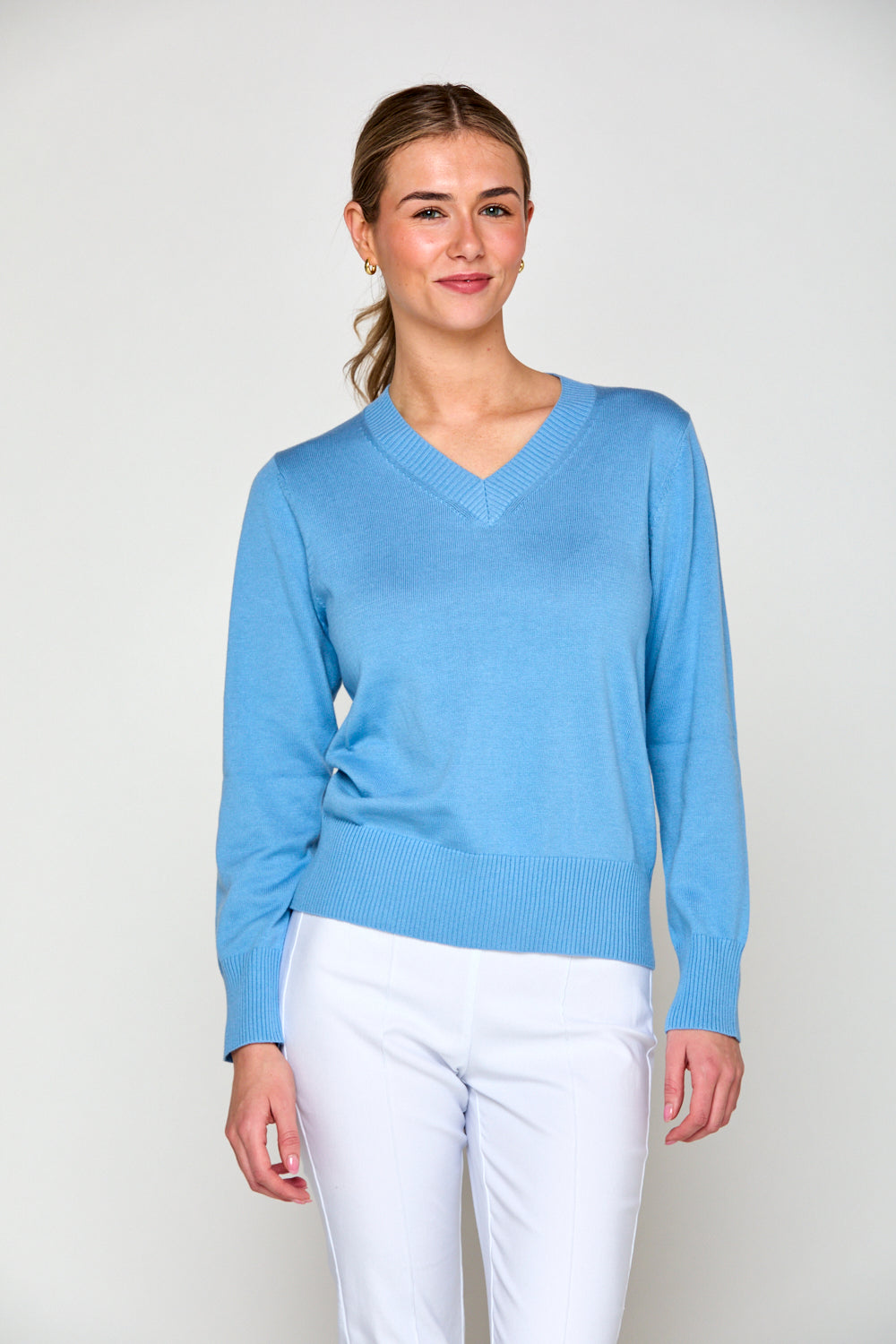 Woman in v neck sweater