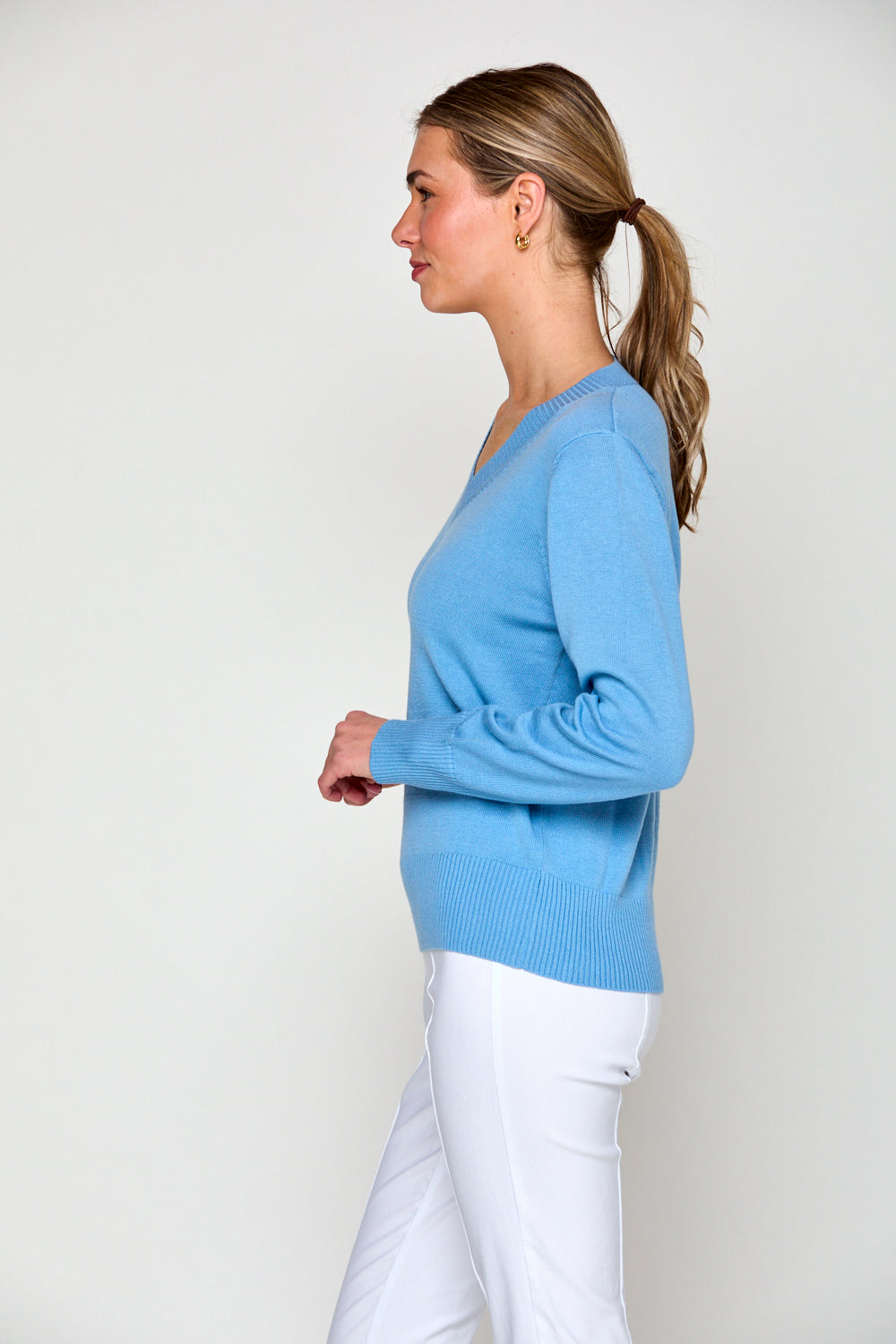 Woman in v neck sweater