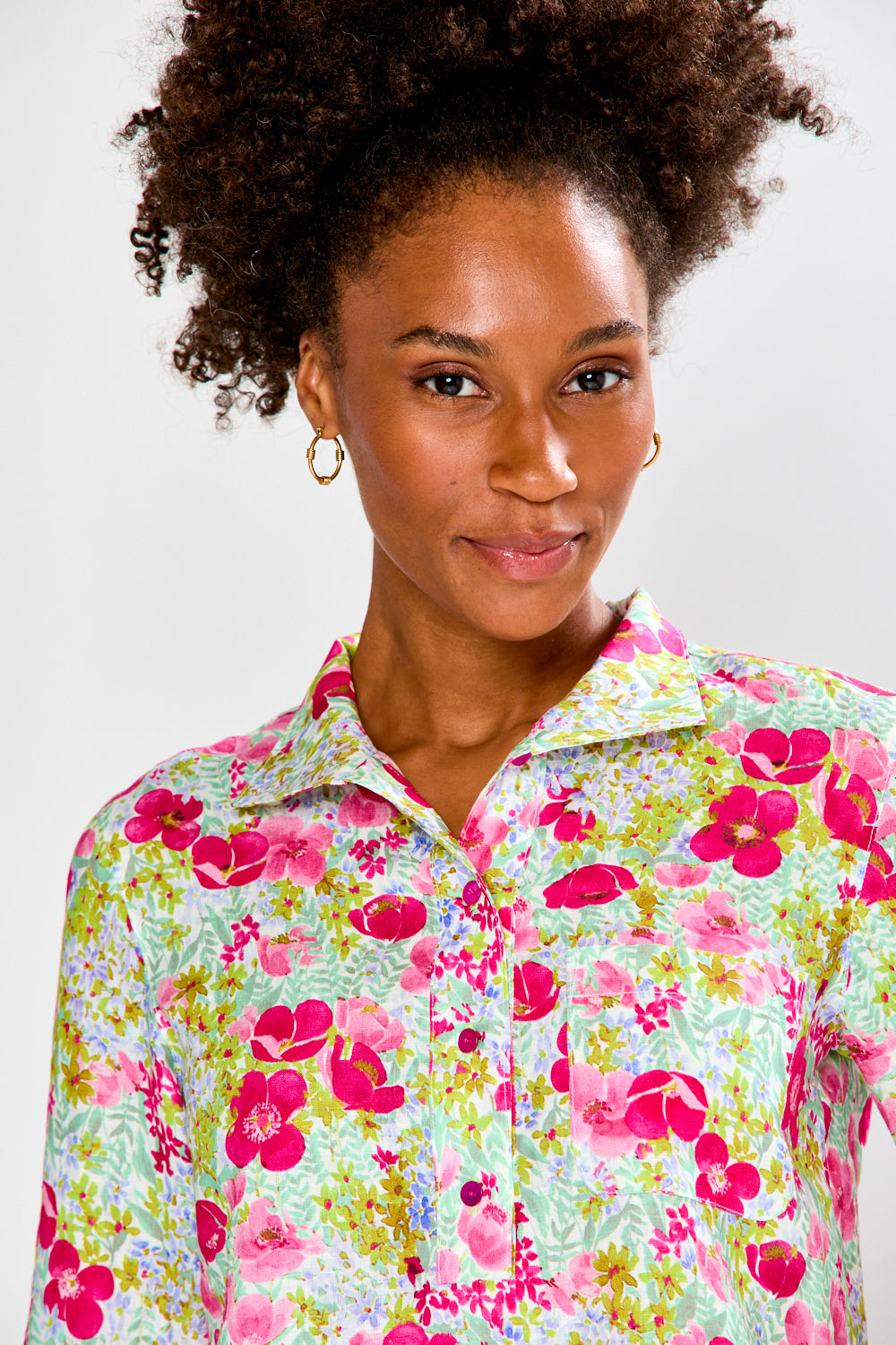 Woman in floral tunic