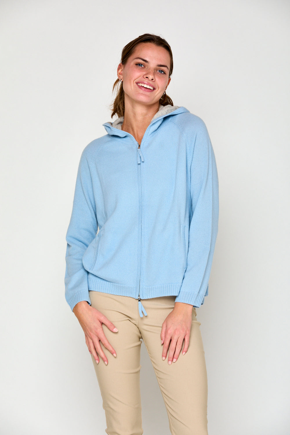 Woman in arctic cashmere hoodie