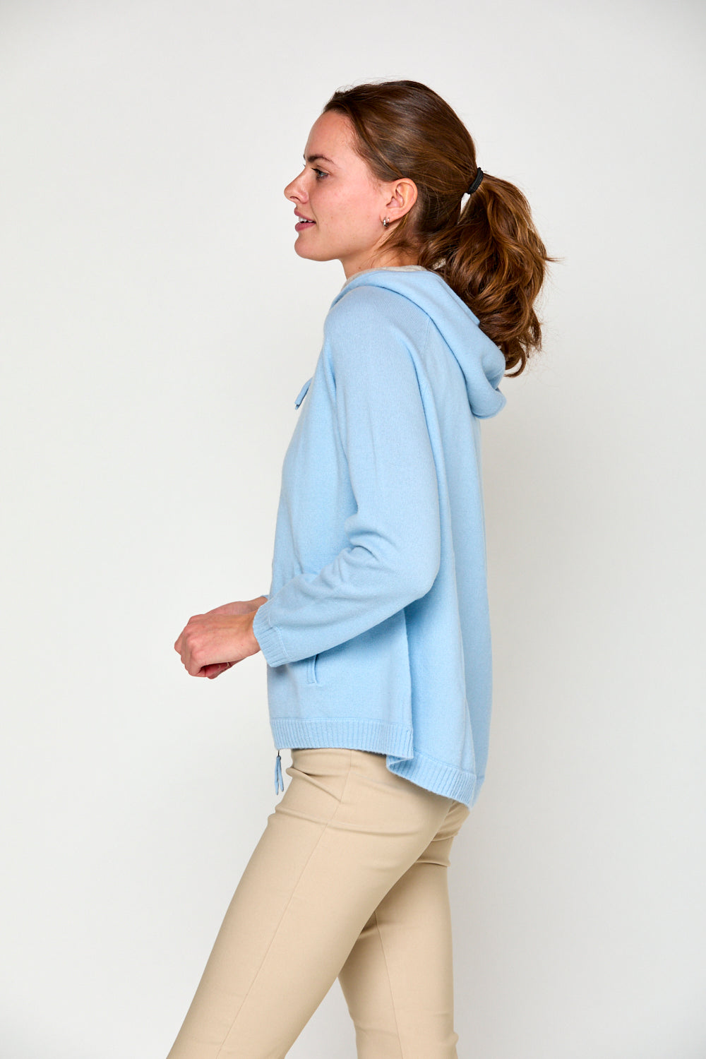 Woman in arctic cashmere hoodie