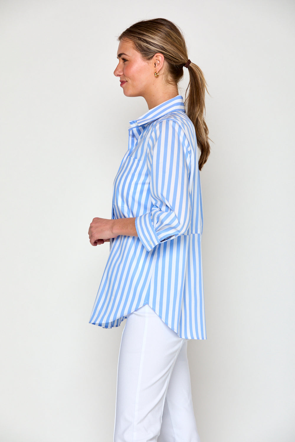 Woman in blue and white stripe blouse