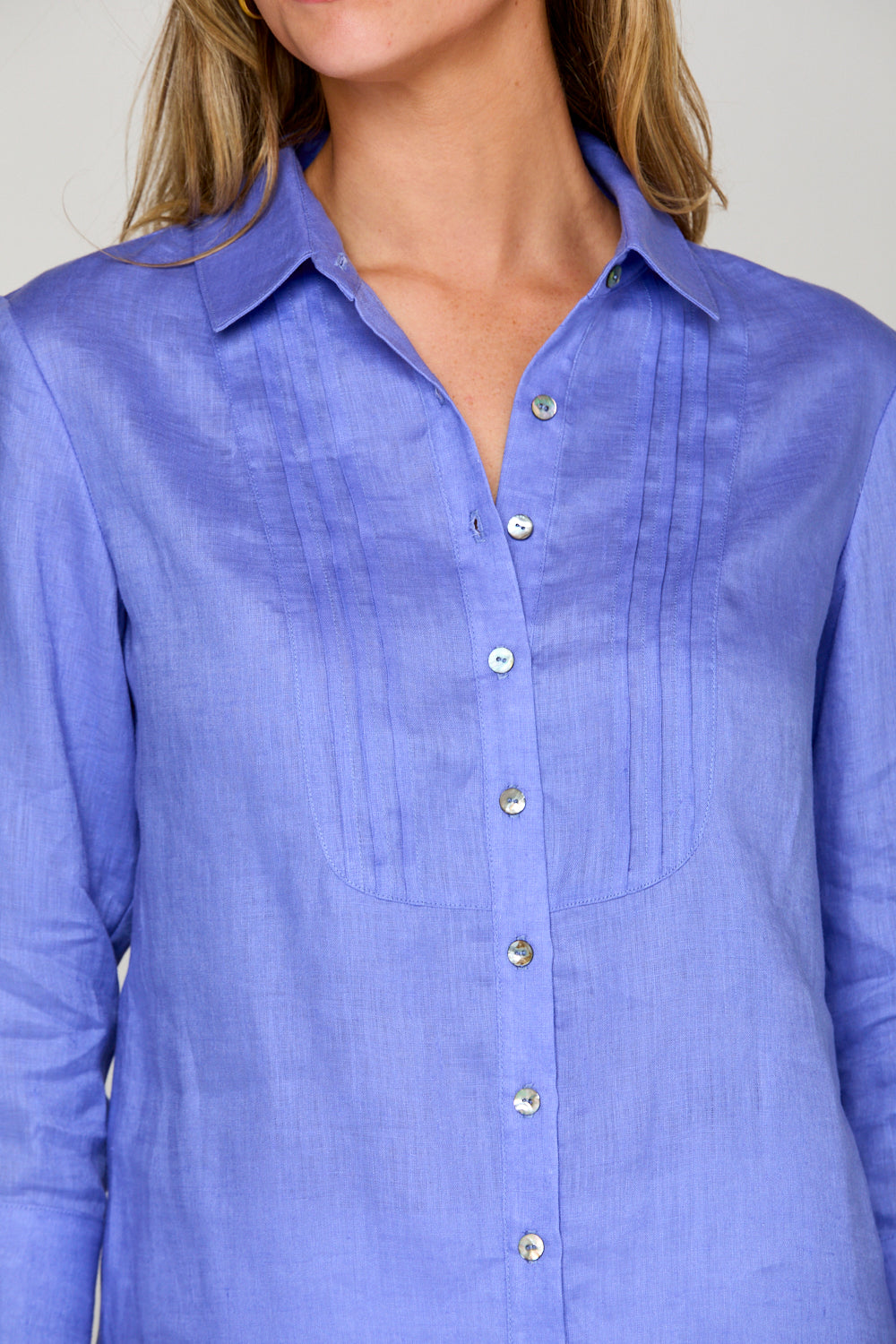 Woman in periwinkle blouse