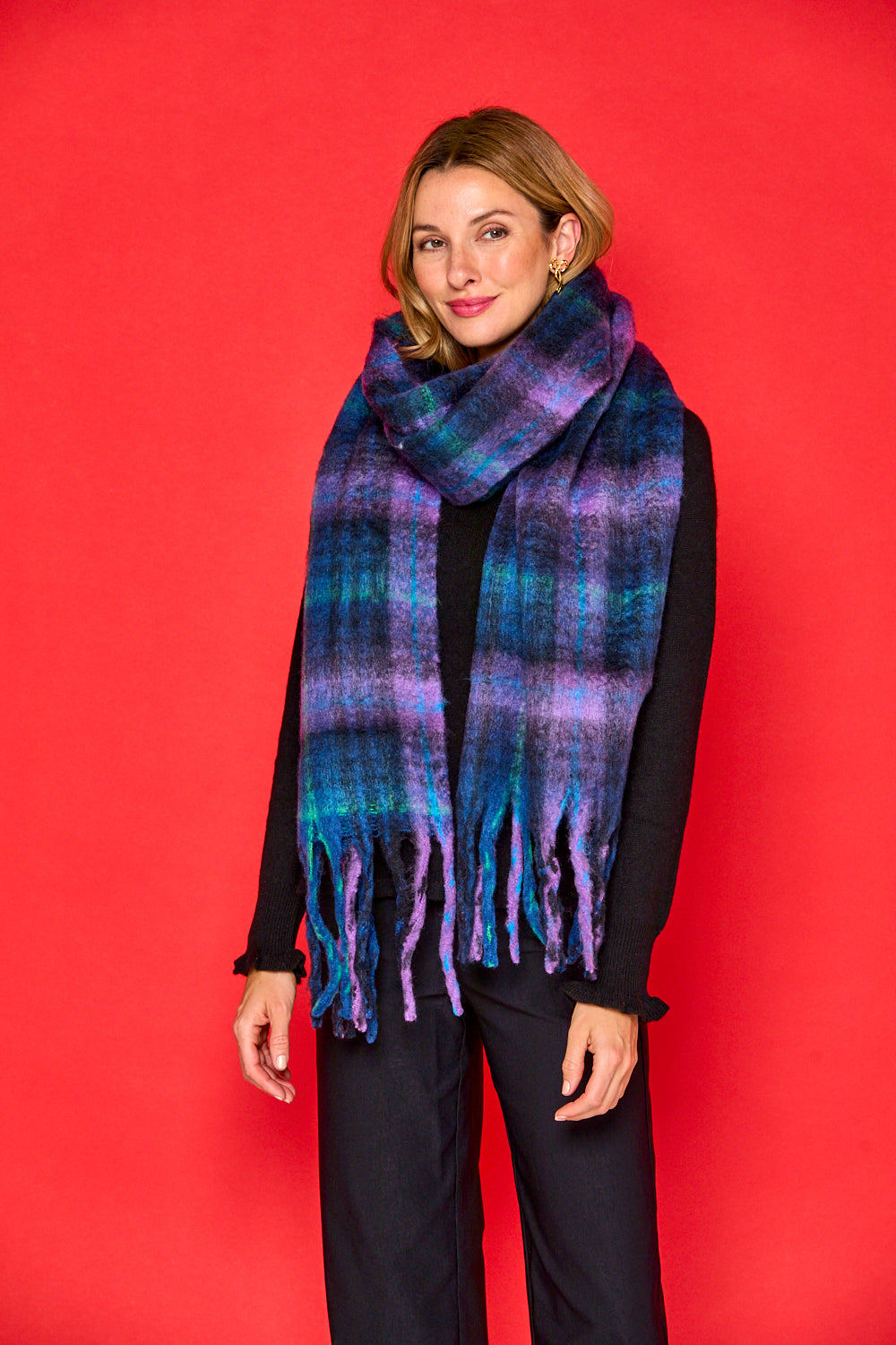 Woman in navy blanket scarf