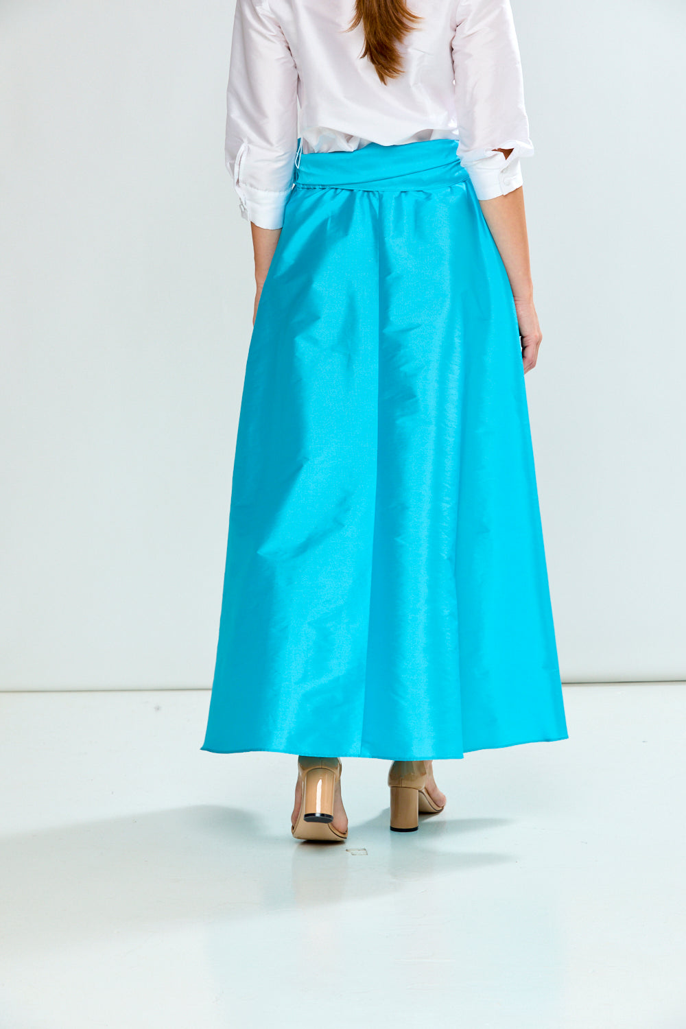 Woman wearing The Deanna Taffeta Skirt in Spring Colors
