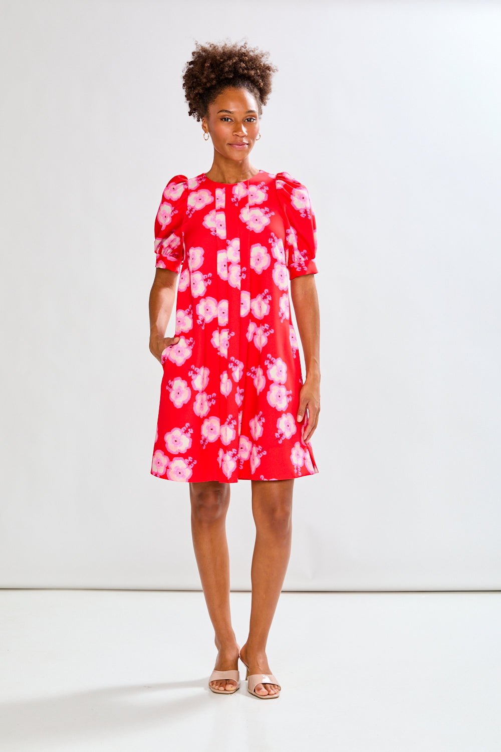 Girl in red dress with flowers