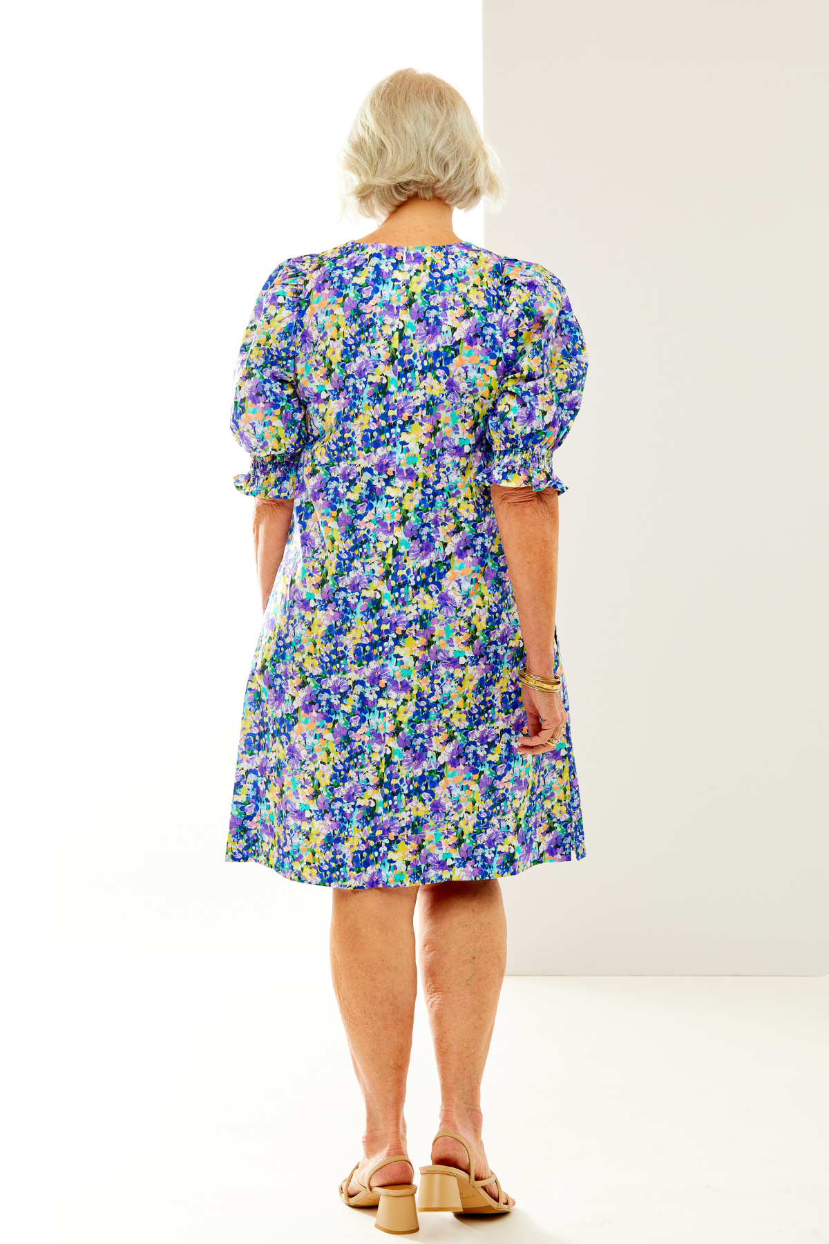 Woman in floral printed dress