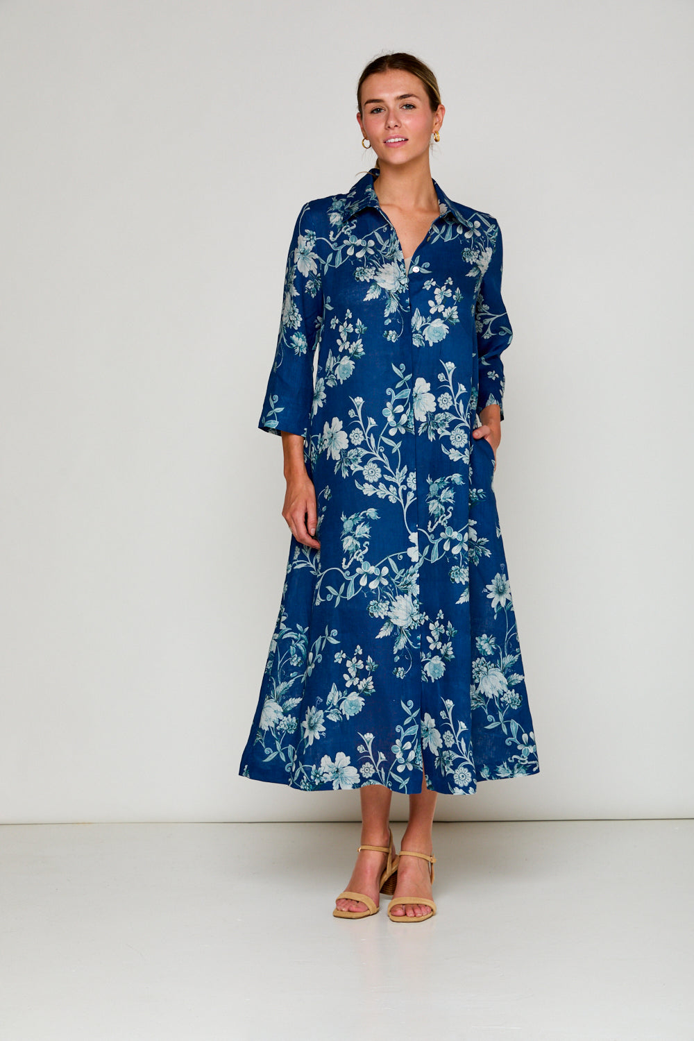 Woman in navy floral dress