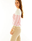 Woman in peony striped pullover