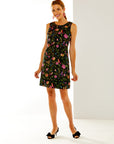 Woman in floral embroidered shift dress