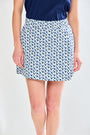 Woman in blue printed skort