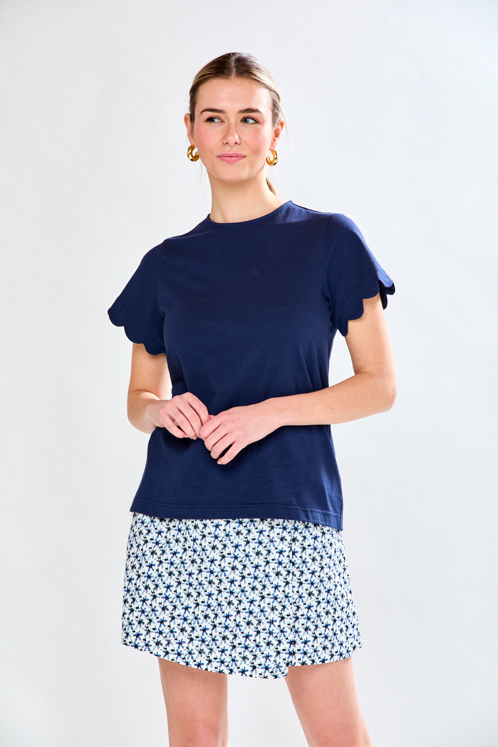 Woman in blue printed skort