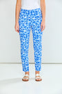 Person wearing blue floral pants on a white background