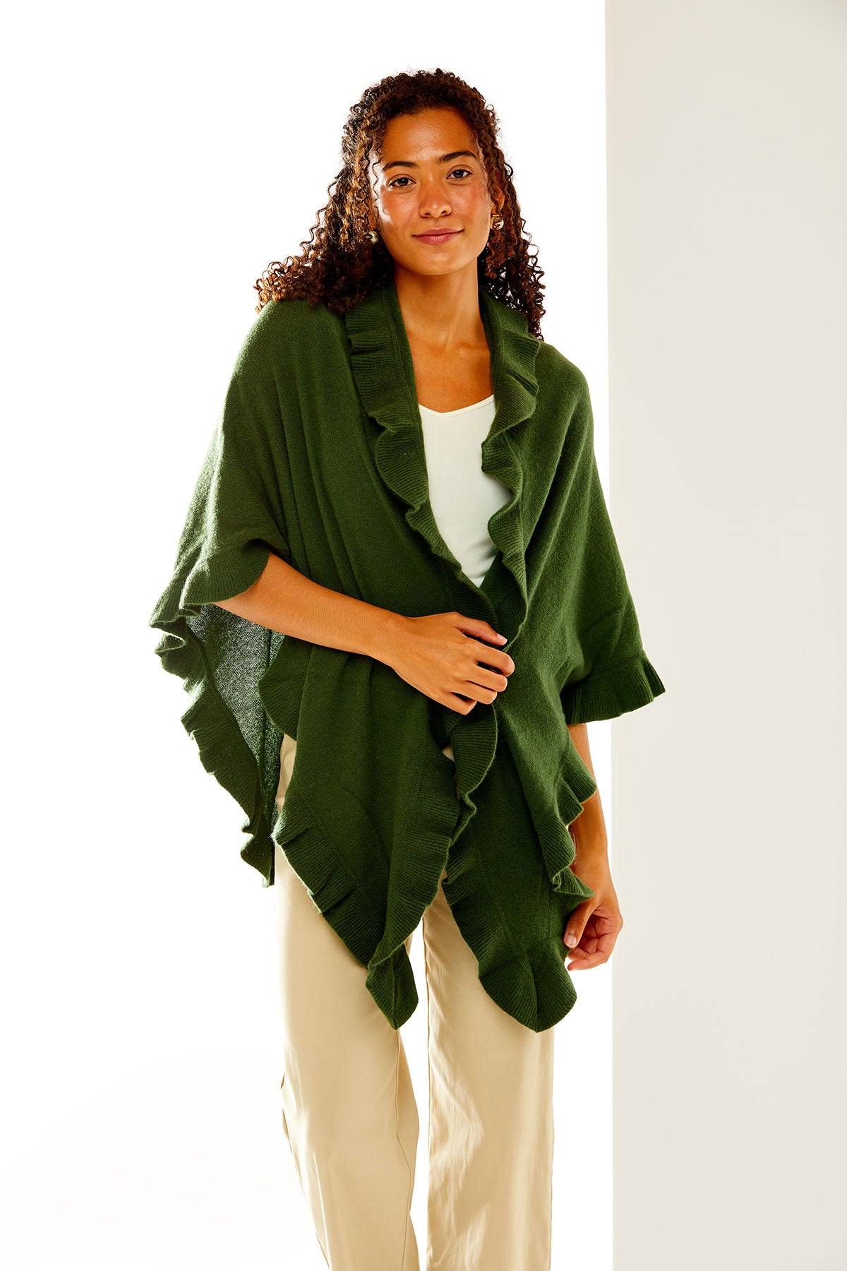 Moss cashmere wrap with ruffle edge. Perfect for everyday wear and as a cocktail attire accessory