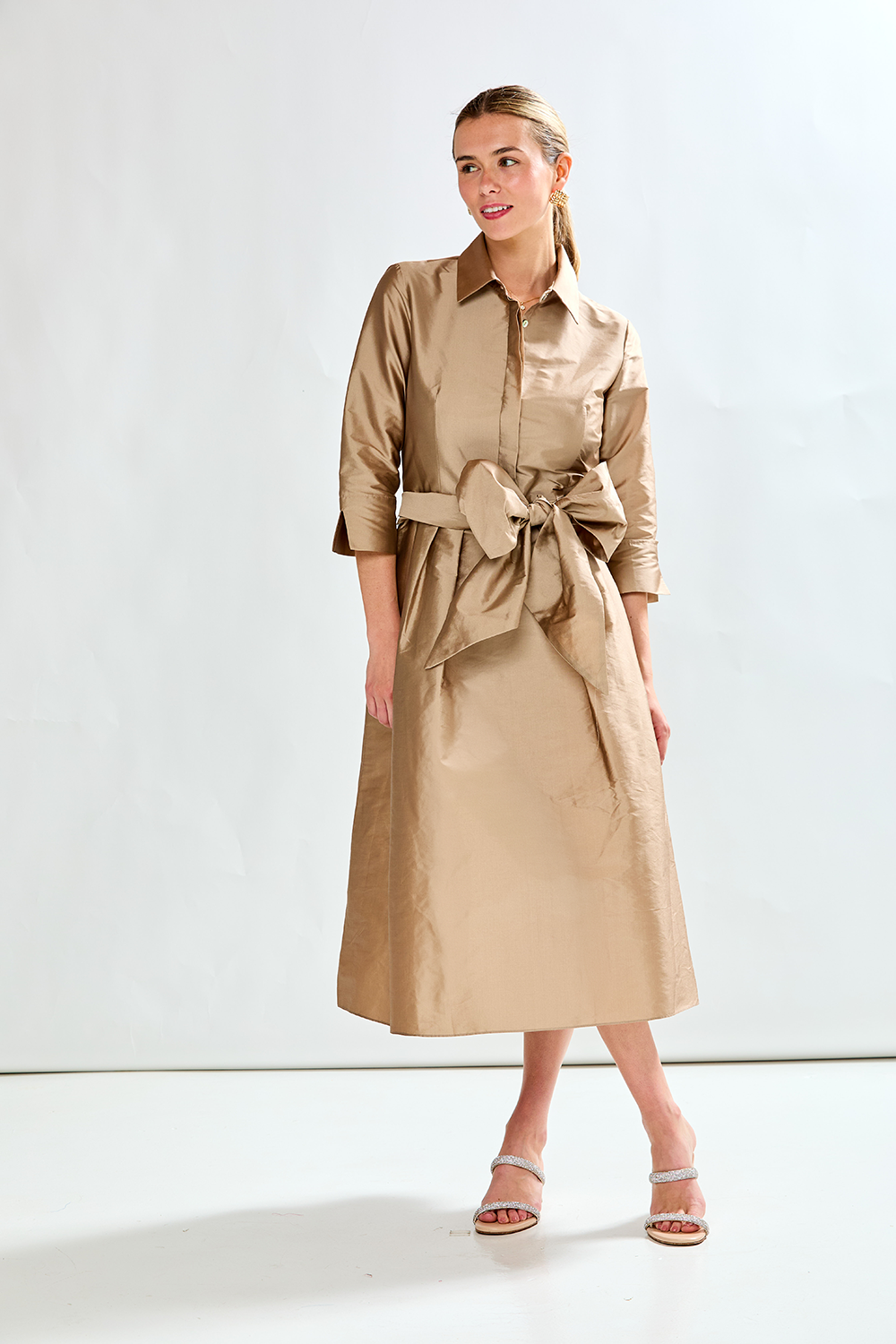 Woman in mocha taffeta dress