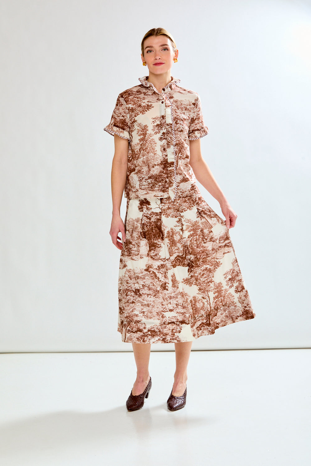 Woman in toile print skirt