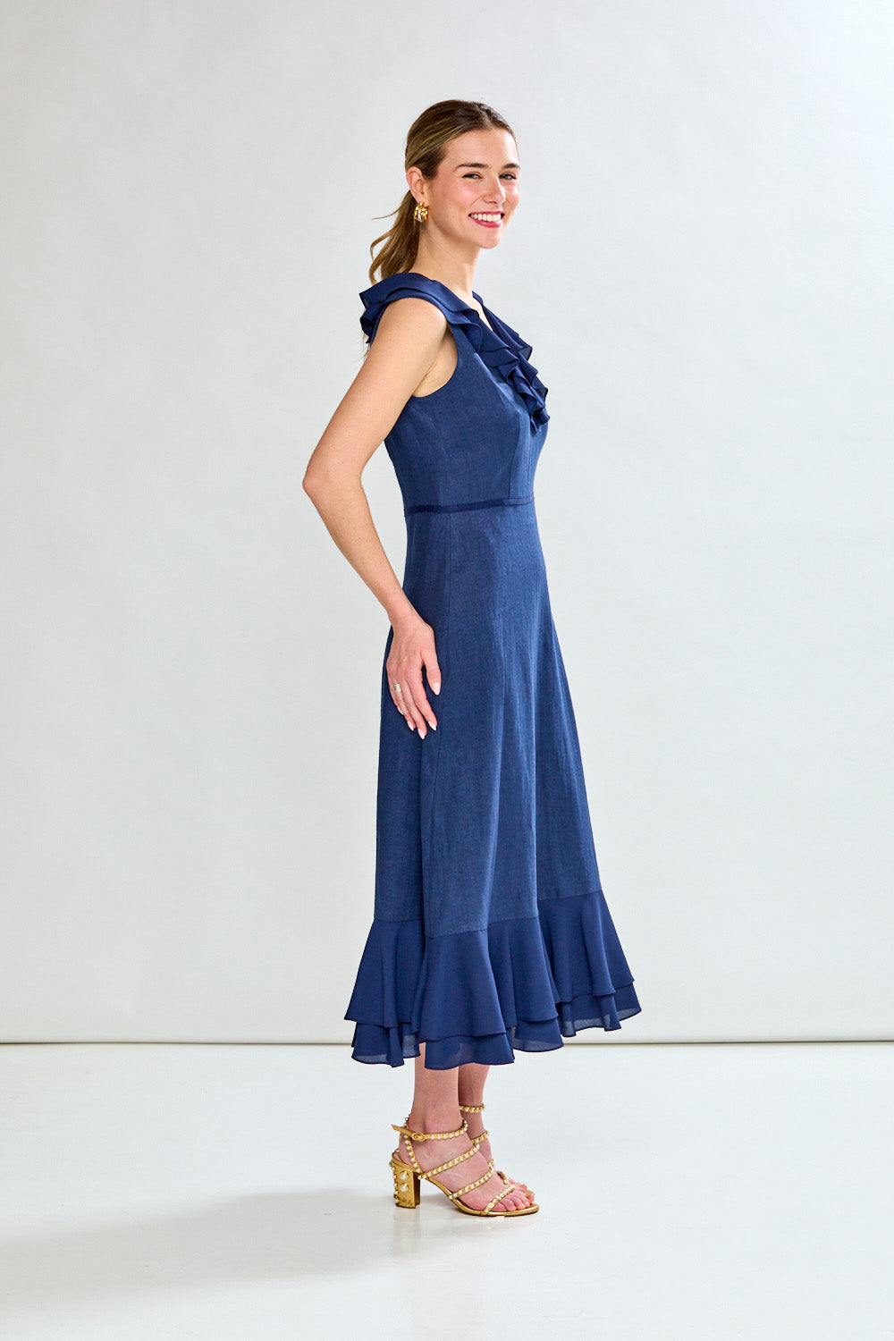 Woman in navy tea length dress