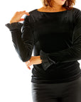 Woman in black velvet top
