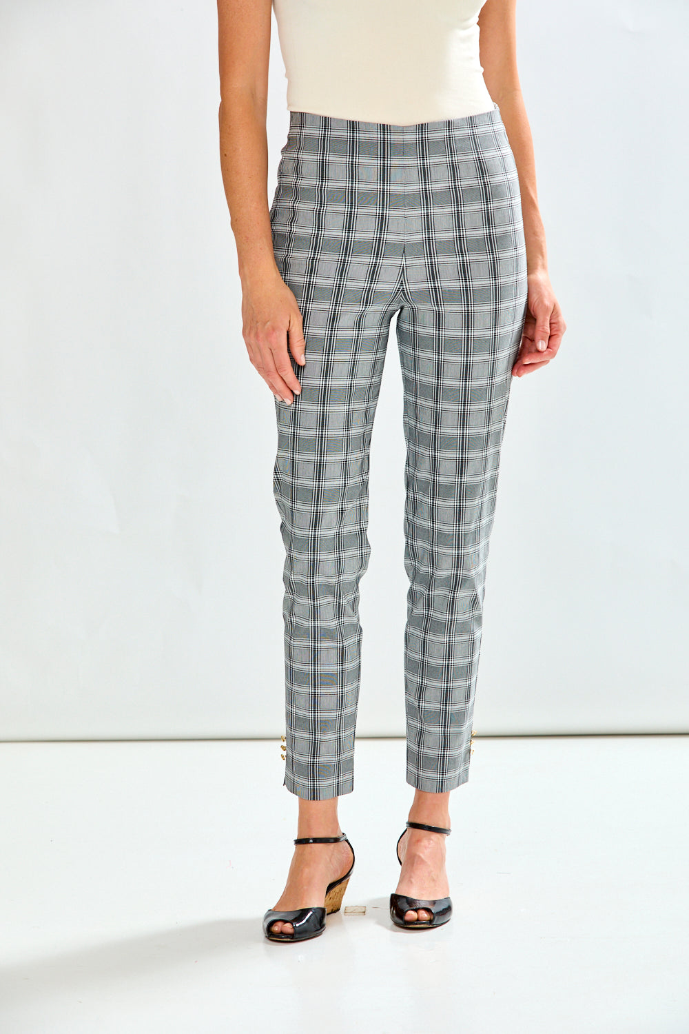 Woman wearing plaid pants 