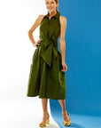 Woman in olive dress