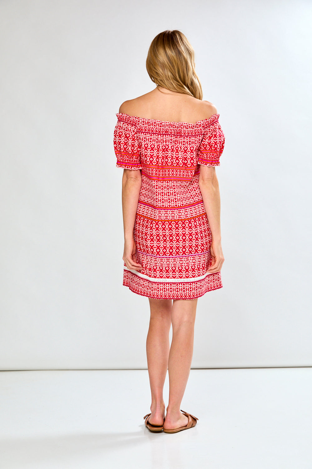 Woman in red printed dress