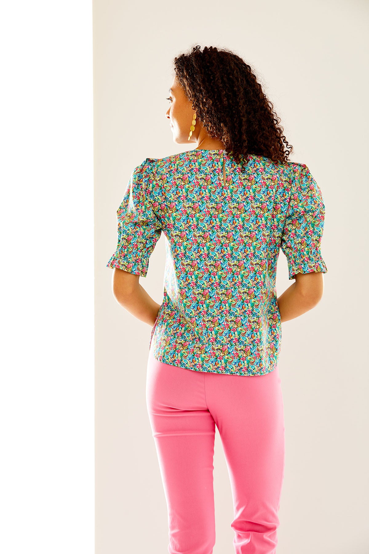 Woman in blossom print top