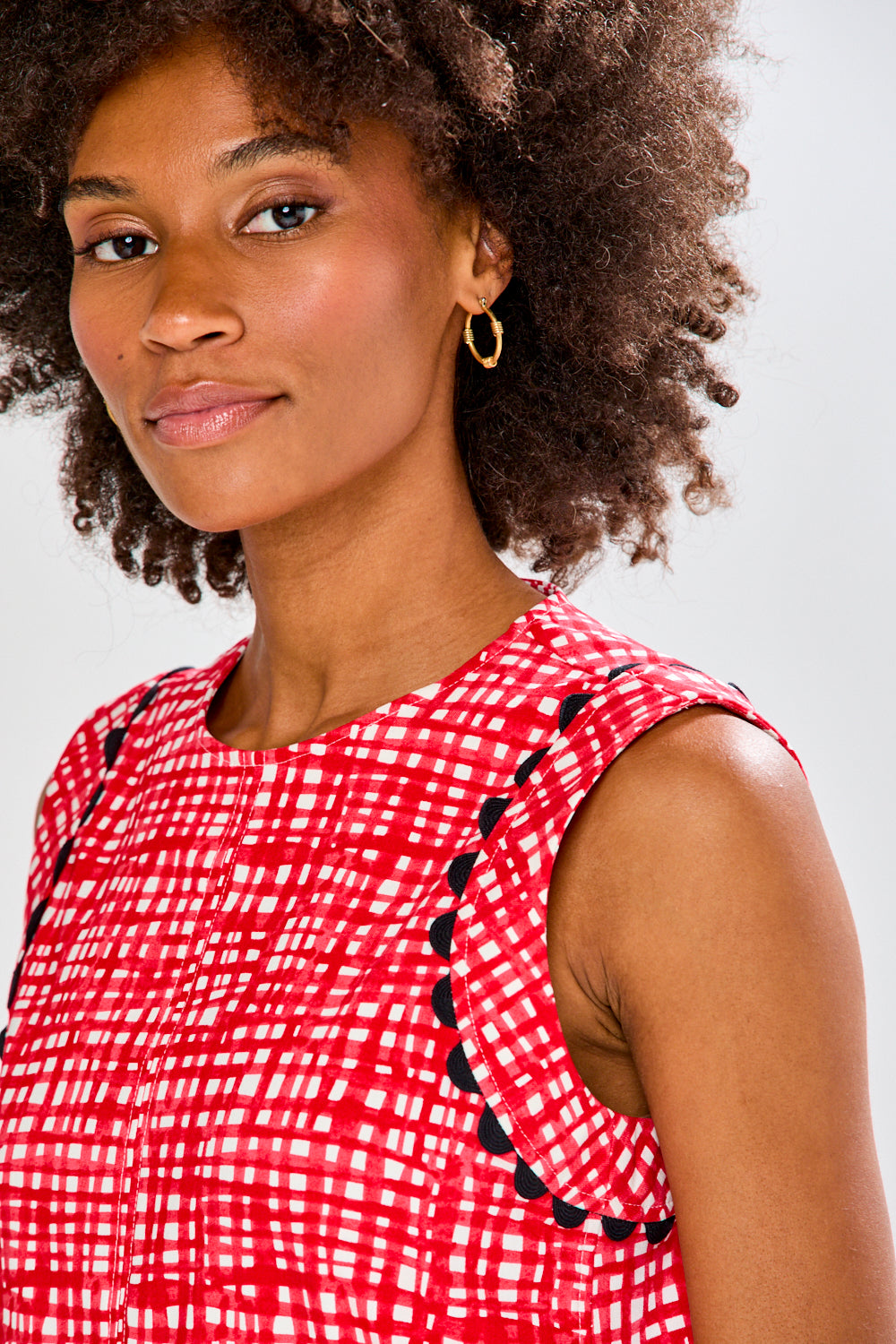 Woman in red patterned dress
