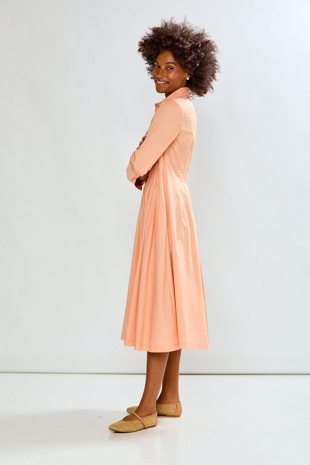 Woman in peach dress