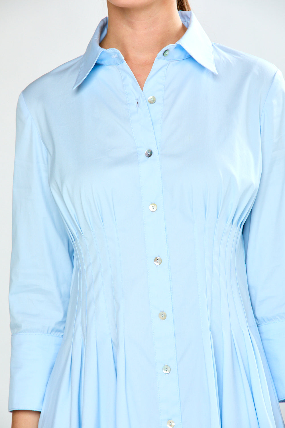 Woman in light blue dress