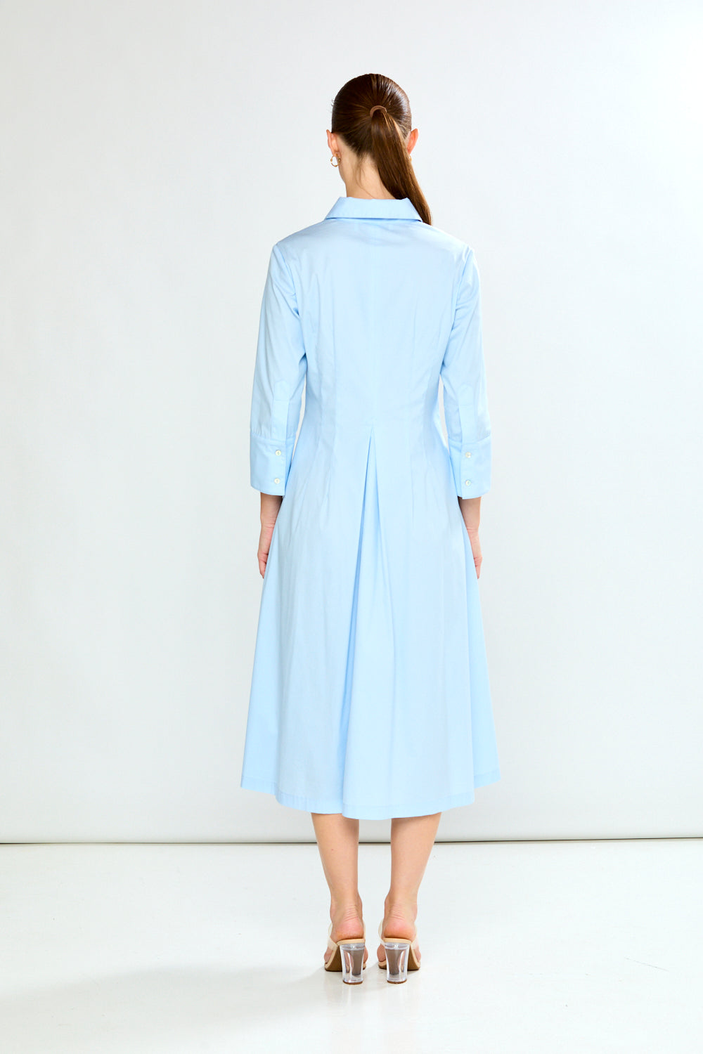 Woman in light blue dress