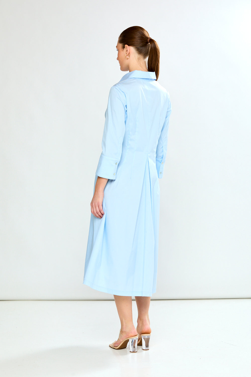 Woman in light blue dress