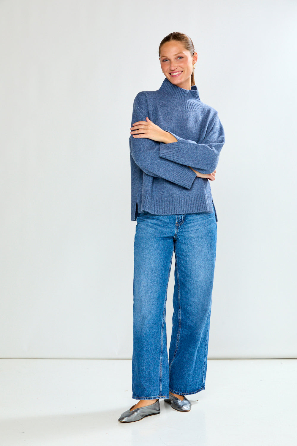 Woman in denim sweater with jeans