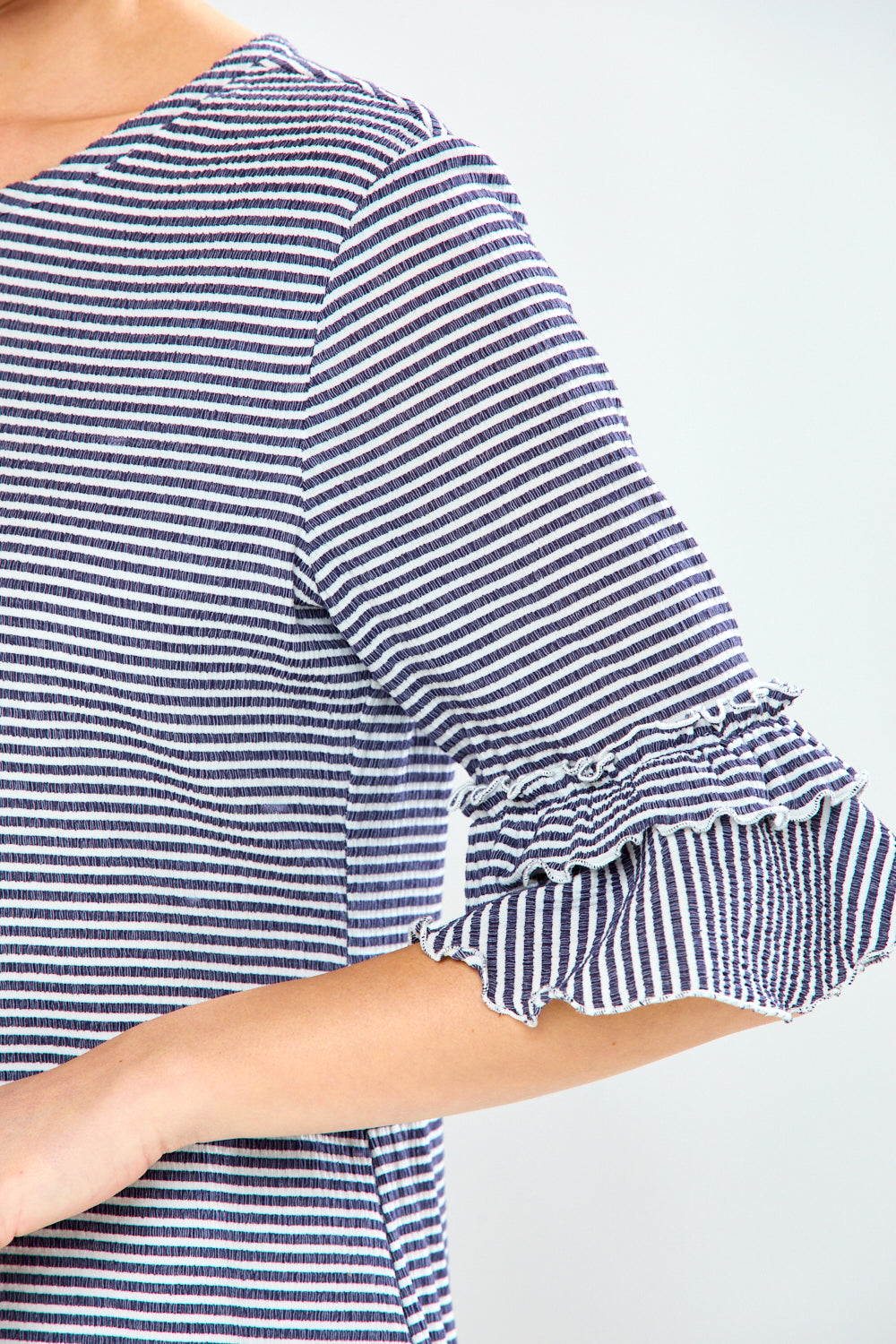 Woman in striped dress