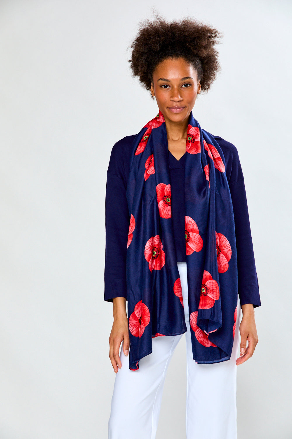 Woman in navy poppy scarf