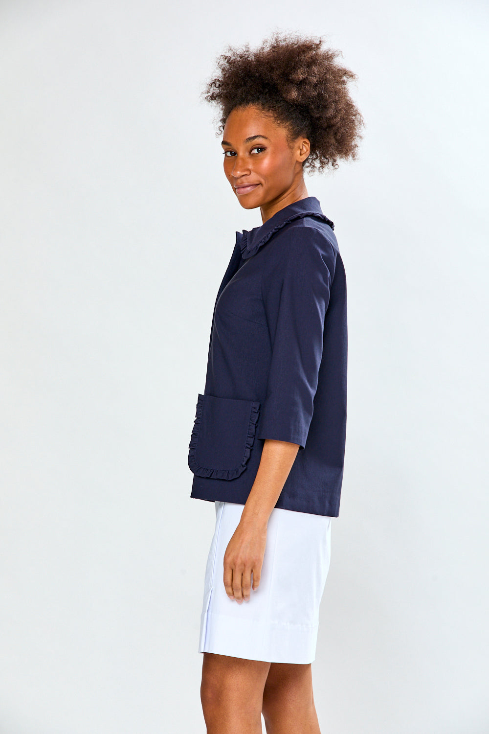 Woman in navy jacket