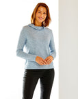 Woman in soft blue sweater