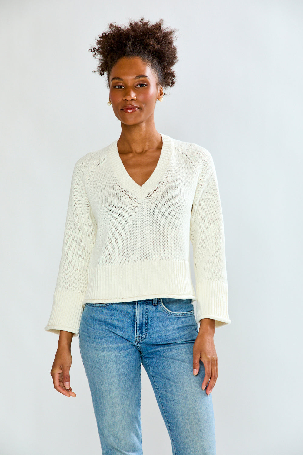 Girl in sand sweater