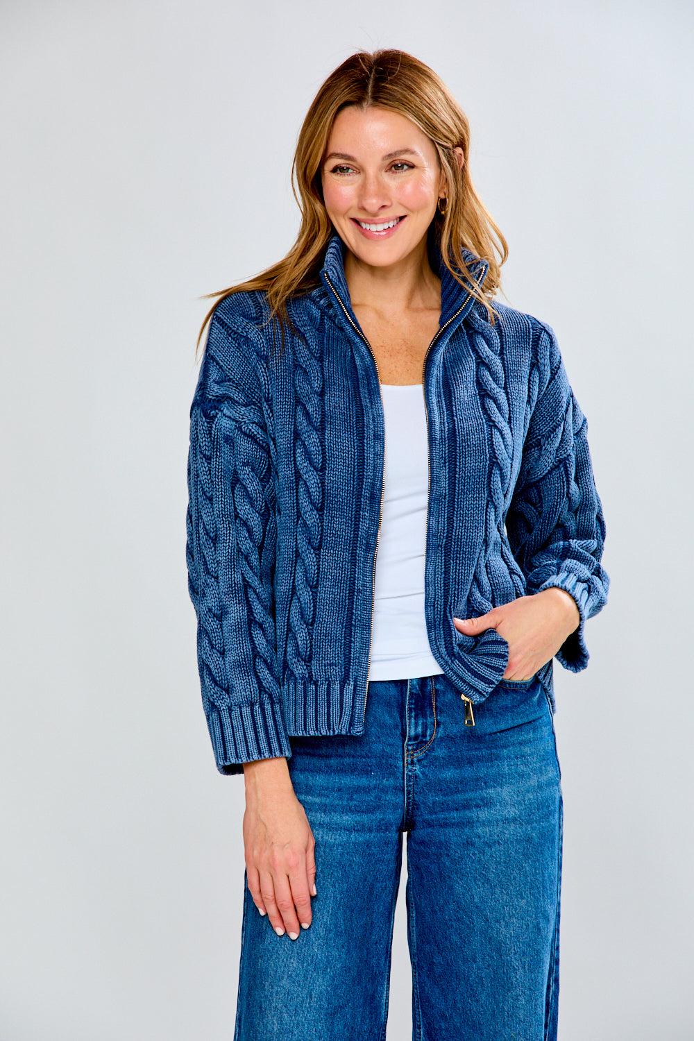 woman in navy sweater