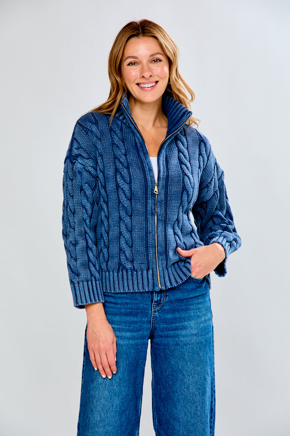 woman in navy sweater