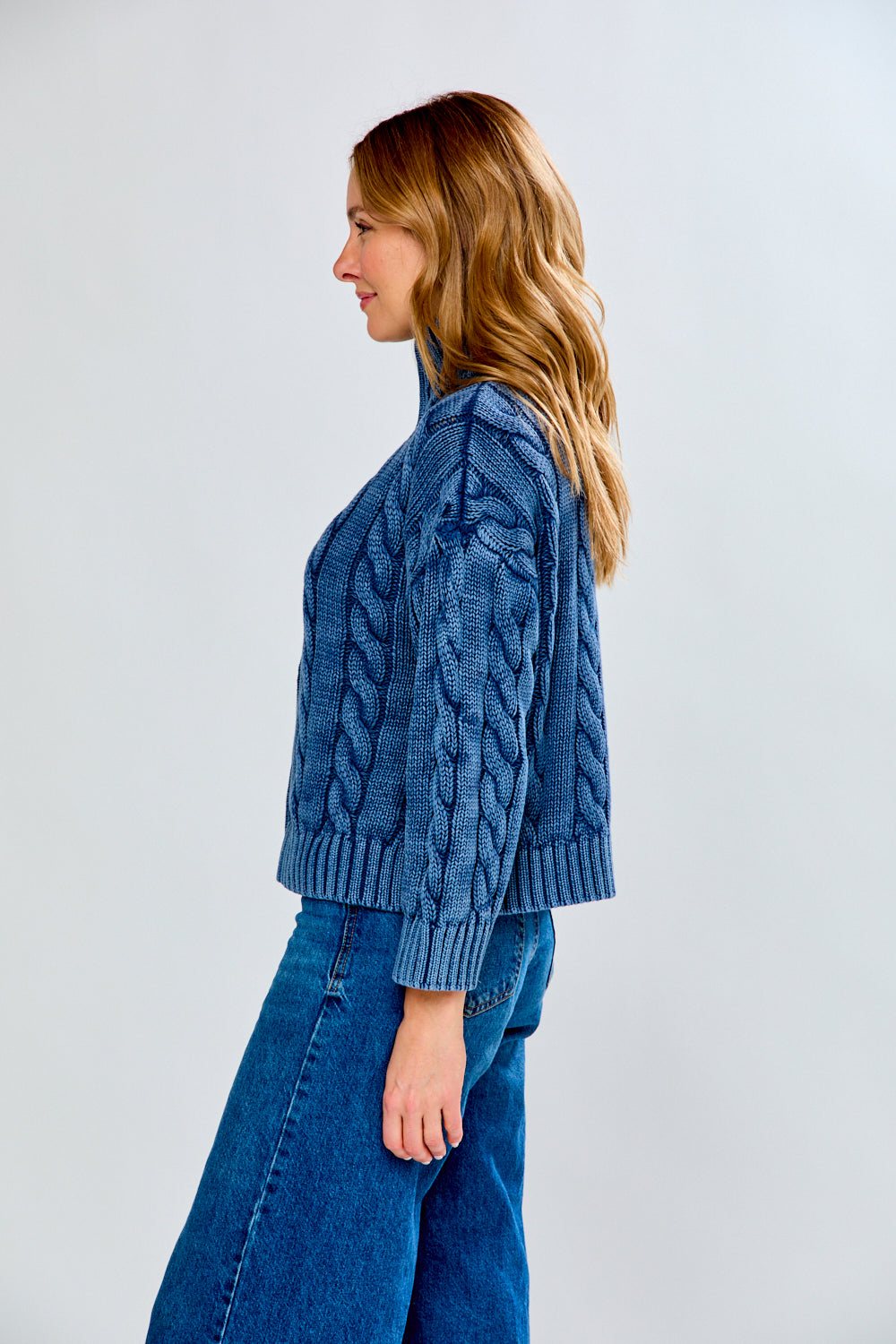 woman in navy sweater
