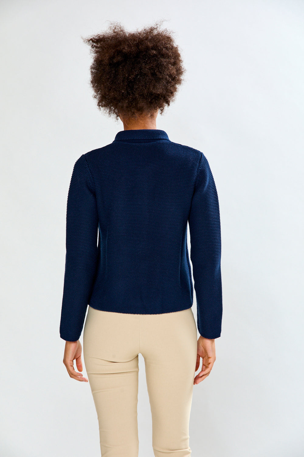 Woman in Navy Cardigan