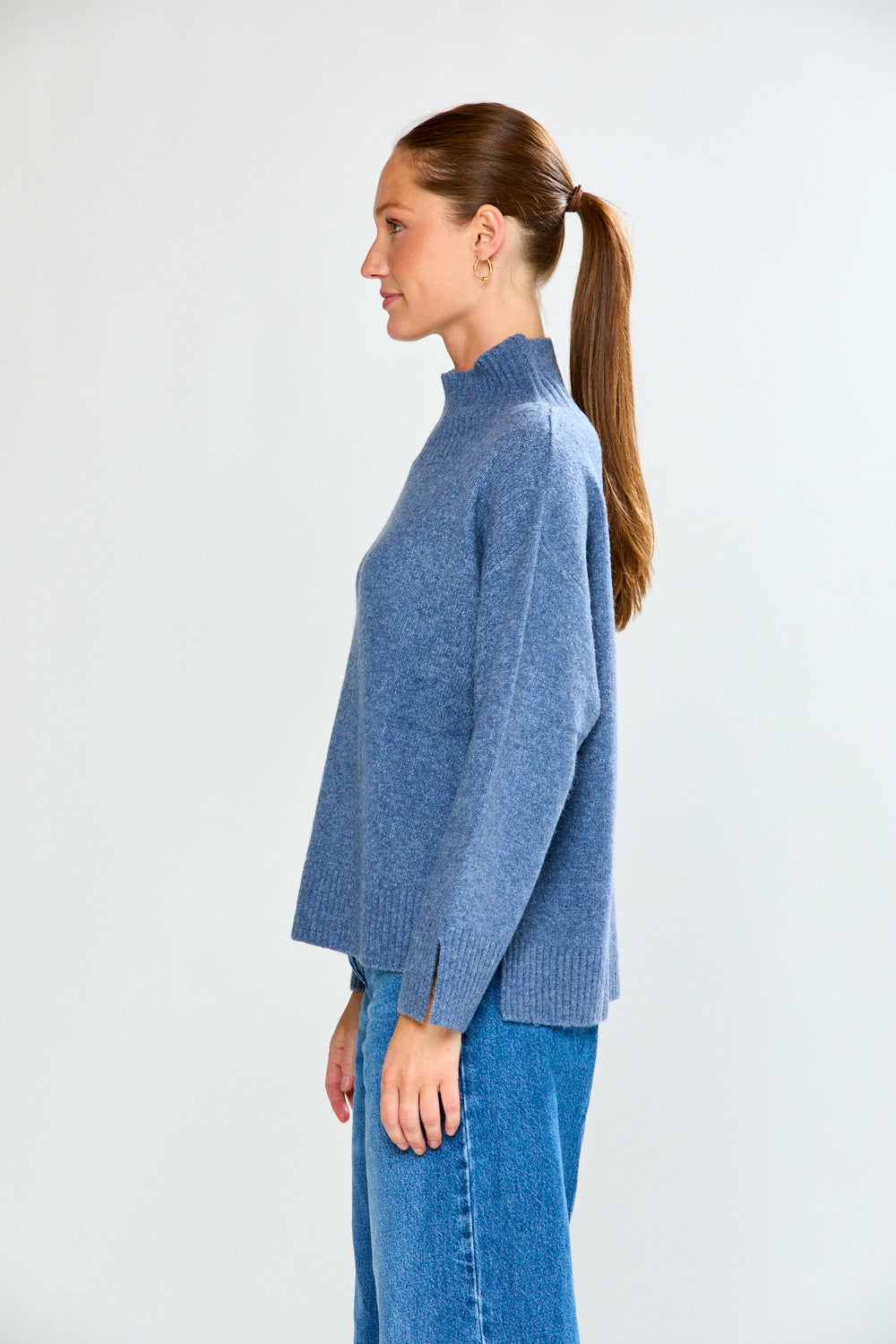 Woman in denim sweater with jeans