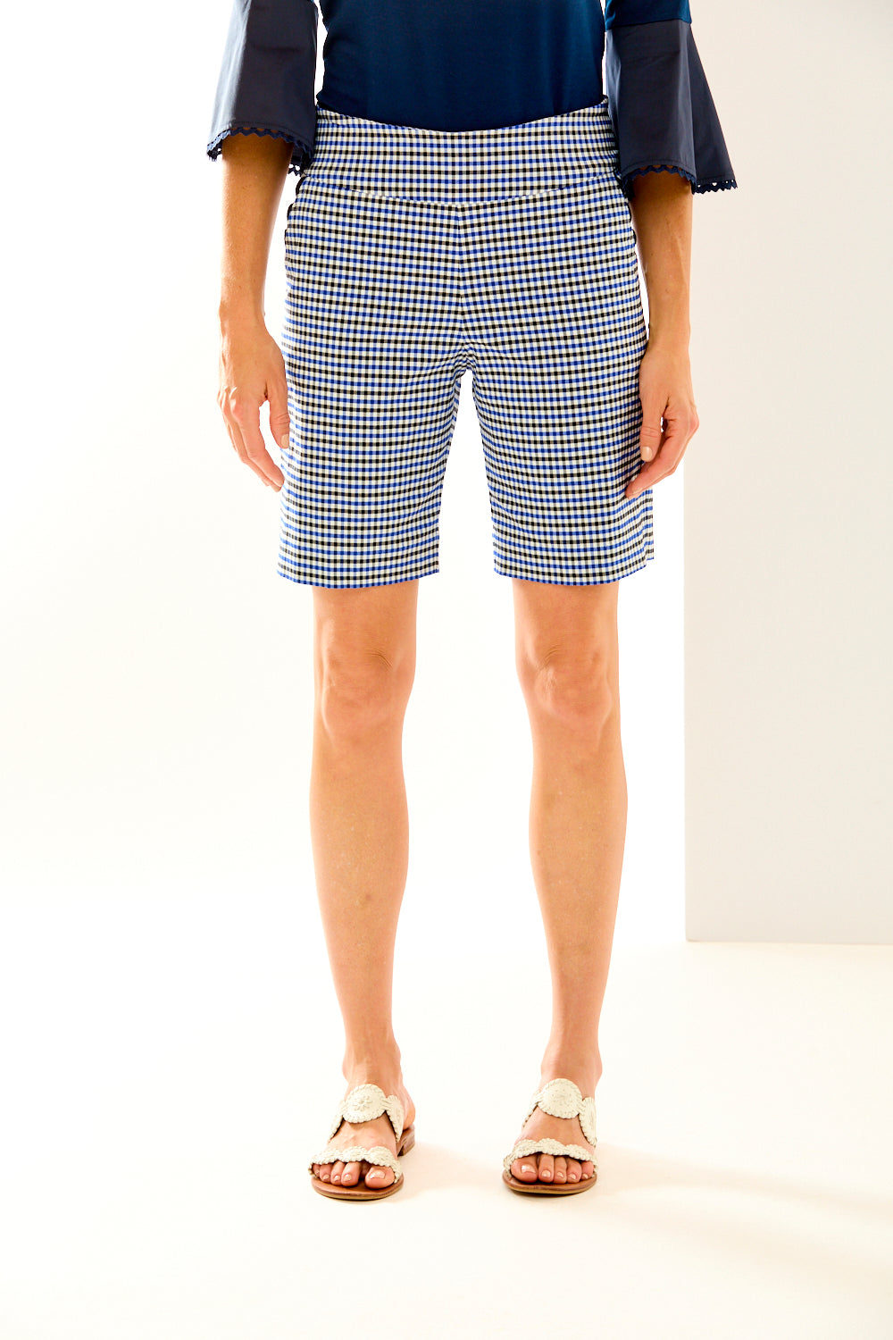 Woman in check slash pocket short