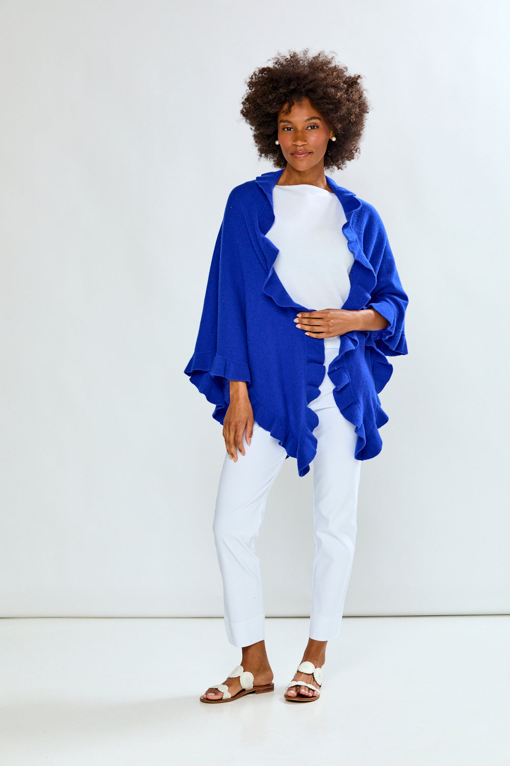 Woman in blue cashmere triangle wrap