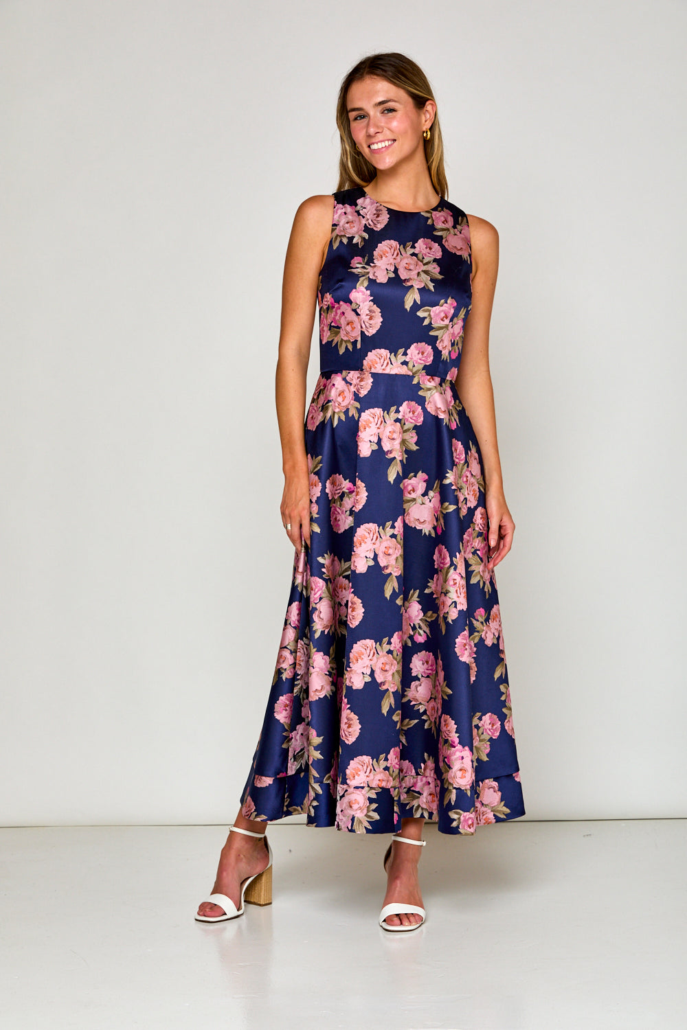 Woman in navy floral dress