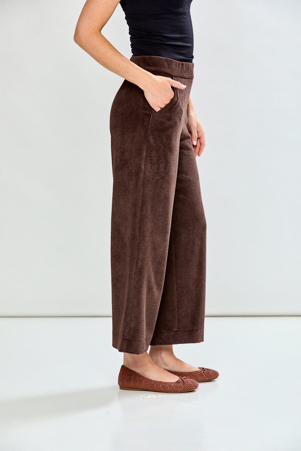 Woman in espresso corduroy pant